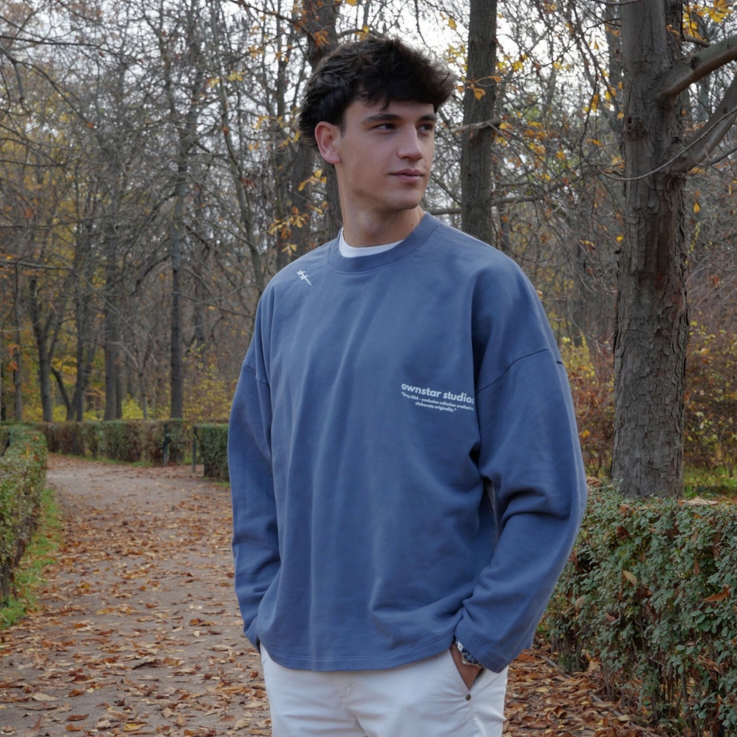 Detail of heavyweight 400 GSM cotton fabric on OWNSTAR STUDIOS crewneck
